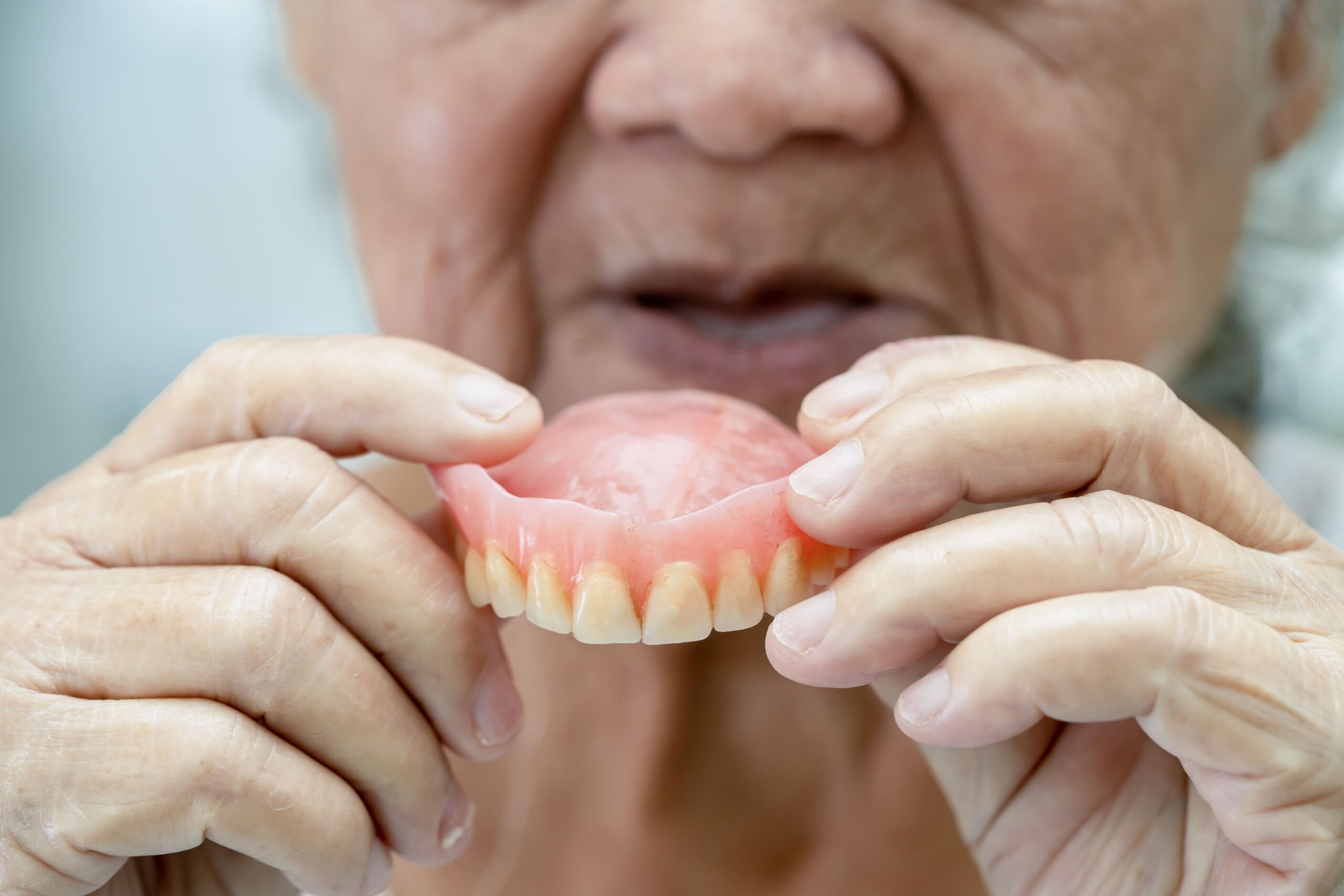 what should i soak my dentures in at night